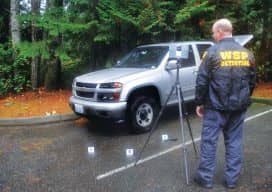 Rod Green uses a TX5 scanner to capture data; because the system can be operated by one person, it frees personnel for other tasks.