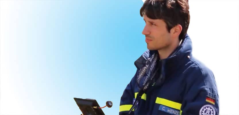 A representative from The German Federal Agency for Technical Relief operates a UAV.