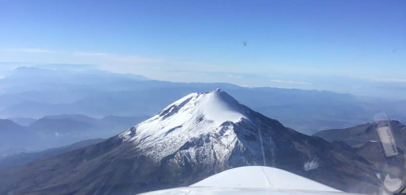 The Citation photogrammetry jet approaches Pico de Orizaba, the third highest peak in North America at 18,491 feet above sea level, on a photogrammetry mission.