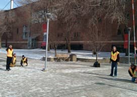 Surveying and civil engineering technology students (left to right: Wyatt Spencer, Brandon Davis, Jeremy Brunell, B.J. Klenke, Jake Blue, and Joe Irey) plumb up the rod before taking a measurement of the shadow in order to recreate Eratosthenes’ method for calculating the circumference of the Earth.