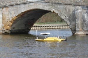 A remote-controlled  survey vessel uses interferometric sonar in very shallow water. 