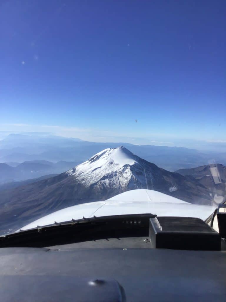 The Citation photogrammetry jet approaches Pico de Orizaba, the third highest peak in North America at 18,491 feet above sea level, on a photogrammetry mission.