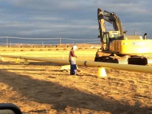 Lance Fugate of Enmapp inspects pipeline construction using TerraGo Edge on iPad in Canada