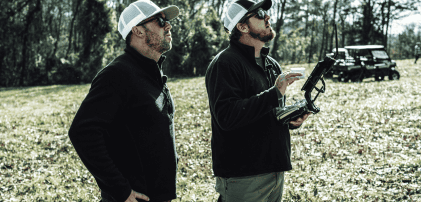 Jeff Davis (left) and Nick Tucker (right) monitor the mdLiDAR1000 as it collects data during the Big Creek surveying mission.