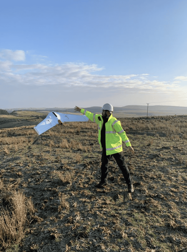 Derek Baxter, senior surveyor with Johnson, Poole and Bloomer, in Glasgow, Scotland, shows that launching Delair’s UX11 mapping drone is almost as easy as throwing a Frisbee.