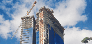 The signature wave-shaped curtain wall nears completion at Waiea Tower.