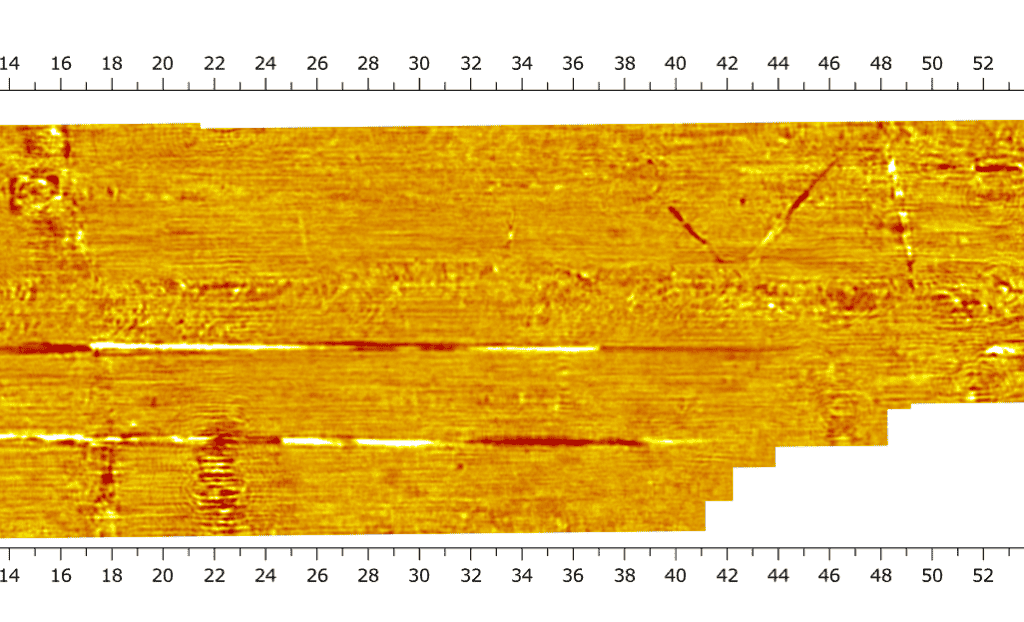 Processed time slice with Condor, 34 inches below ground surface. Underground utilities present at that depth show up as linear features in the data.