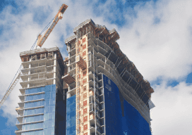 The signature wave-shaped curtain wall nears completion at Waiea Tower.